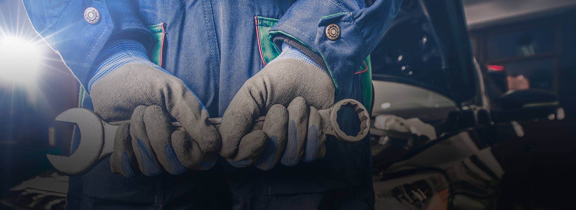 Mechanic with spanner in hand